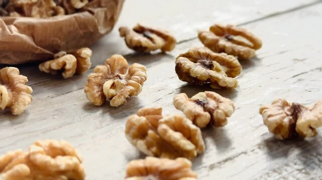 Peeled walnuts on the table.
