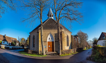 Scenic View of Nyord historic round Brick Church on Sunny Day, Denmark