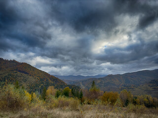 The landscape of Carpathian Mountains in the cloudy weather. Perfect weather condition in the autumn season