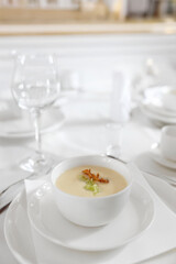 Cream of white vegetables, cheese supa, slice of bacon