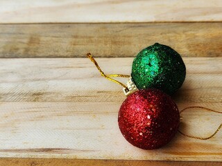 Christmas  ball decorations on wood background