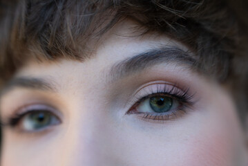 closeup of a professional eye makeup of a young girl