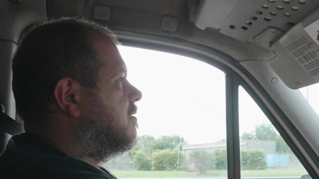 A truck driver experiences a moment of drowsiness during the journey but wakes up just in time to maintain control of the vehicle.