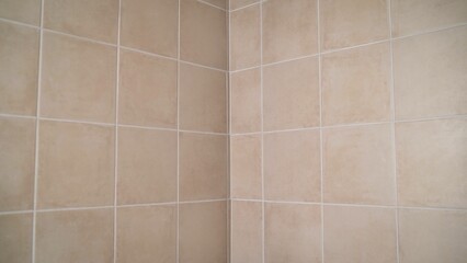 Smoothly gliding camera movement over elegant beige tile surface