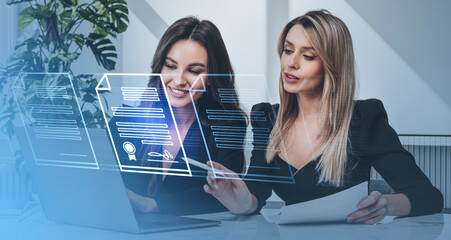 Two businesswomen and virtual screen hud electronic document file with signature