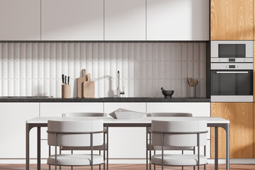 Classsical home kitchen interior with dining table and cabinet, closeup