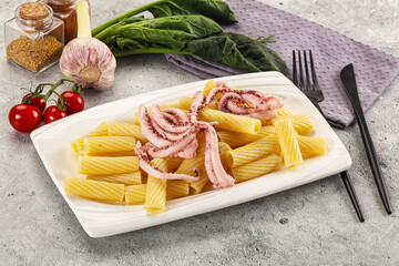 Italian cuisine - pasta tortiglioni with squid