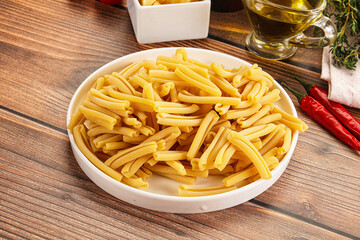 Raw dry Italian pasta - casarecce