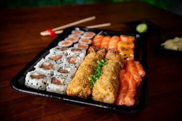 Delectable sushi platter with assorted rolls and sashimi.