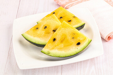 Sweet and juicy yellow watermelon slices