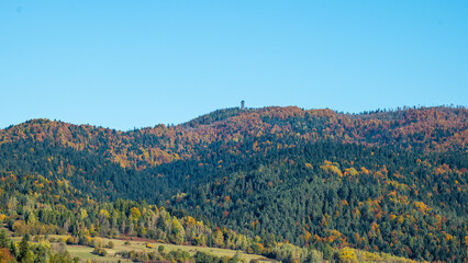 Gorce mountain range. Mountains in autumn. Wooden observation tower on Mount Lubań. Poland