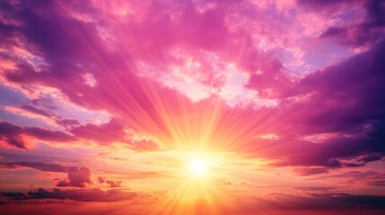 Fototapeta premium A vibrant sunset with rays of light piercing through colorful clouds.