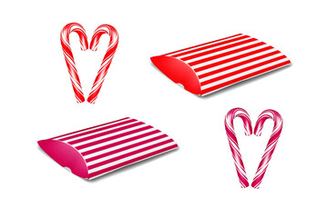 Obraz premium Christmas red and white striped paperboard pillow box gift packaging with candy cane peppermint sticks. Template for present Xmas design. Easy editable
