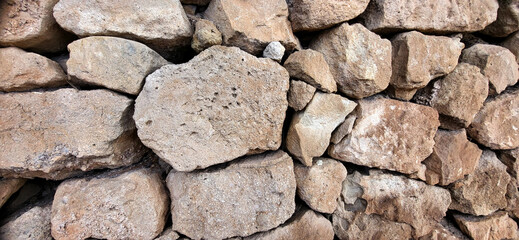 Old stone wall. Rock texture