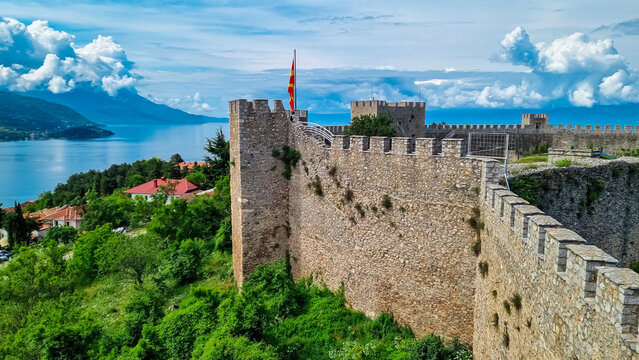 Historical landmark Samoil's Fortress overlooking Lake Ohrid, North Macedonia. Ancient stone walls, towers, and ramparts offers a popular tourist attraction. Panoramic views of surrounding mountains
