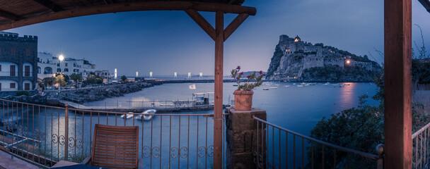 View of Aragonese Castle at dusk, Port of Ischia, Island of Ischia, Campania, Italy, Europe