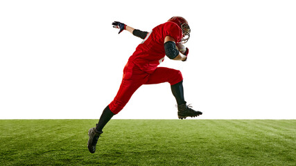 Dynamic image of American football player in red uniform sprinting across the field while holding...