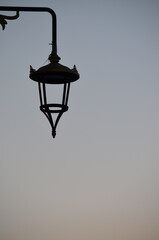 Traditional Street Lamp Silhouette Against the Evening Sky in Marrakech  © Amaro