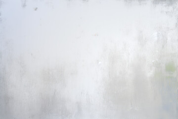 A minimalist, abstract white texture creates a serene and contemplative atmosphere with subtle patterns and gradients.