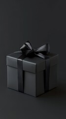 Obraz premium Black Gift Box with Bow on Black Background - Minimalist Gift Mockup