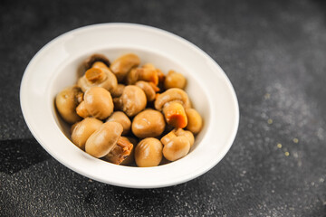 Champignon mushroom canned product tasty food dish fresh delicious gourmet food background on the table 