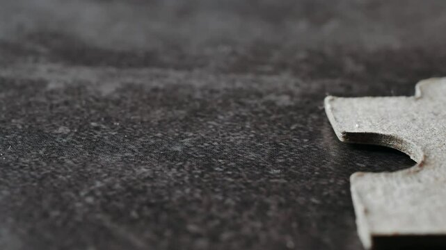 Close up hand holding pieces of jigsaw puzzle, Business solutions, success and strategy concept.