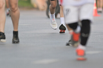 Fitness and sport man running in outdoor by training, exercise and practice for marathon competition of cardio health.Athlete as runner together for performance progress goal