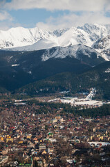 Snow-covered mountain peaks in the Tatras above the town of Zakopane in the Polish mountains