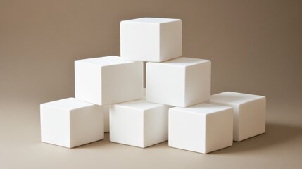 Obraz premium Set of white cubes arranged creatively on a neutral background.