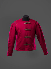 Historical fashion. Medieval knight cloth. Padded jacket gambeson.