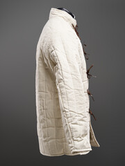 Historical fashion. Medieval knight cloth. Padded jacket gambeson.