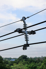 Four way metal power line spacer, Powerline separator, cable spacer and high voltage electric wire with blue sky background