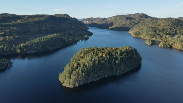 Beautiful Farris Lake in Southern Norway. Zooming out drone footage