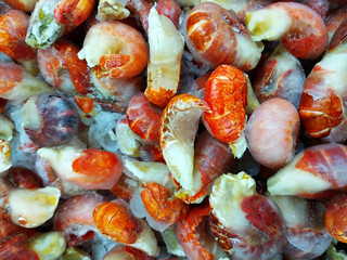 Iced lobster tails sold in supermarkets.