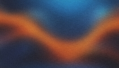 Abstract and modern design with blurred orange light on a grainy dark blue and black background