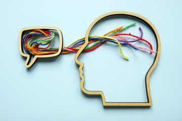 Speech bubble flowing into a head with colorful threads. Empathetic listening and emotional...