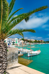 Portocolom's old town at the harbor with traditional boats and boathouses - 2642