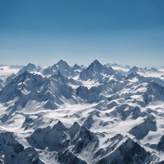 Obraz premium Majestic Snow-Capped Mountains Against a Clear Blue Sky