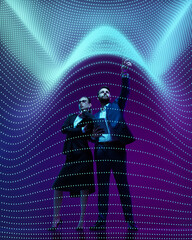 Business man and woman in professional attire analyze complex data visualized as flowing digital...