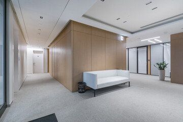 The setting showcases a contemporary office space characterized by clean lines, natural lighting,...