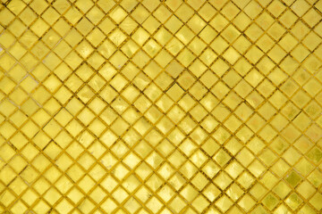 Golden Textured Surface with Diagonal Patterns