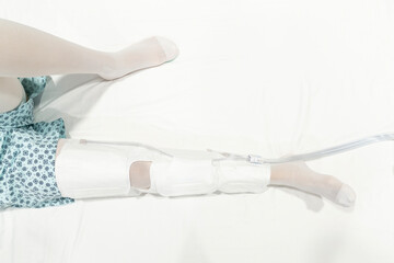 After surgery, pregnancy or varicose veins the patient is dressed in compression stockings by the...