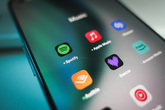 Music and podcast streaming app Spotify on smartphone screen.