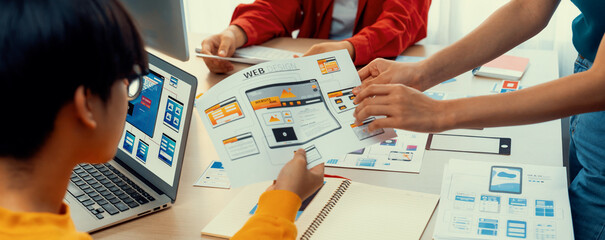 Panorama banner of startup company employee planning on user interface prototype for mobile...
