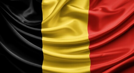Close-up of Belgium national flag with waving black, yellow, and red stripes.