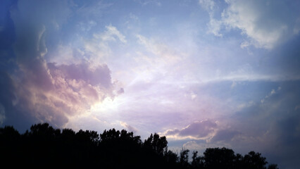 Sunset Sky with Pastel Clouds and Soft Sunlight