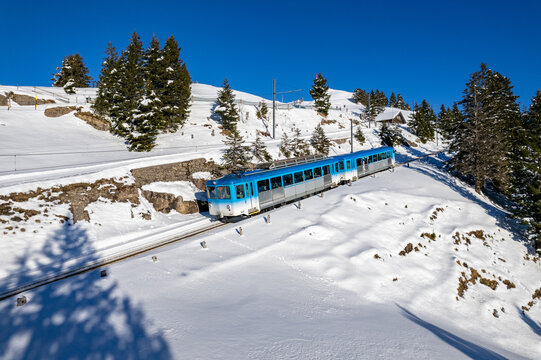 blue vitznau rigibahn train at rigi kulm