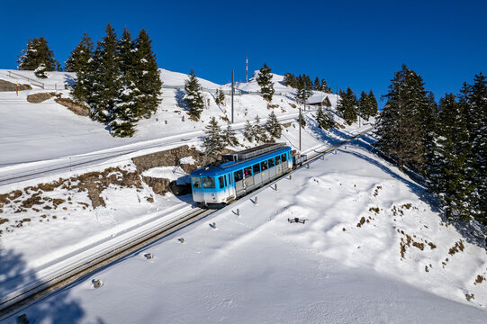 blue vitznau rigibahn train at rigi kulm