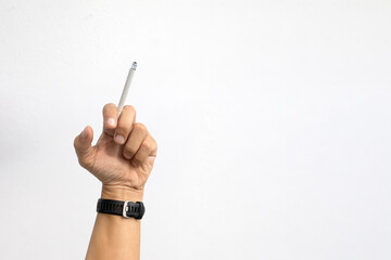 Smoking lifestyle concept with a close-up of a cigarette in hand, symbolizing health hazards, nicotine addiction, and the urgency of quitting smoking for better health.