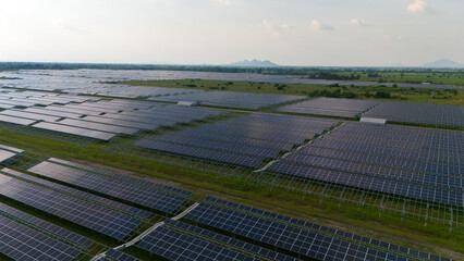 Aerial bird view photo of photovoltaic power station also known as a solar park is large-scale...